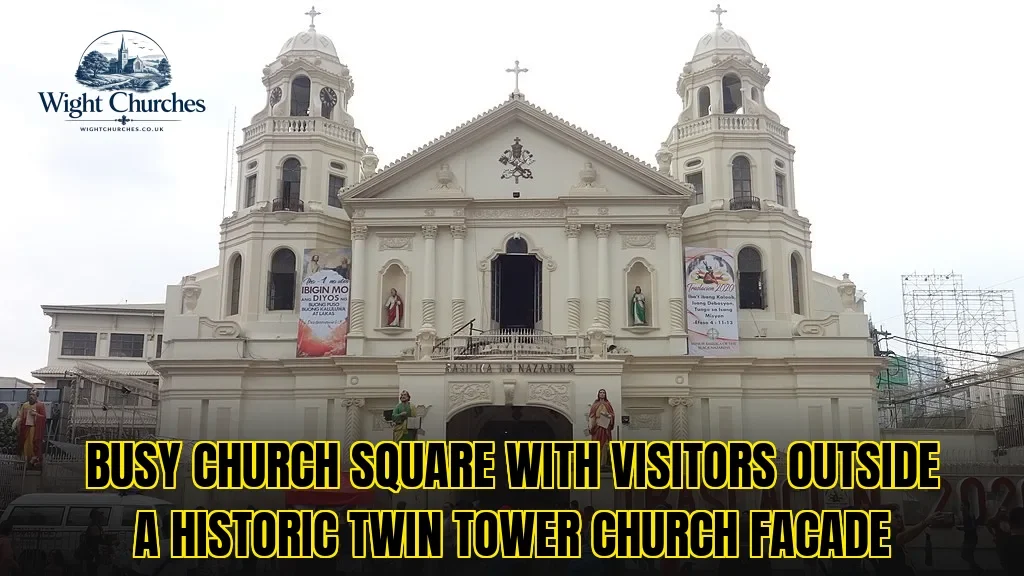 Busy church square with visitors outside a historic twin tower church facade